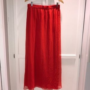 Long red silk skirt